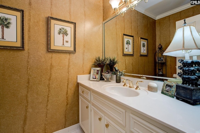 bathroom featuring ornamental molding, tile patterned flooring, and vanity