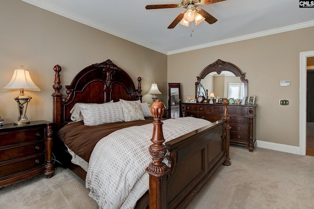 bedroom featuring ornamental molding, light carpet, ceiling fan, and baseboards