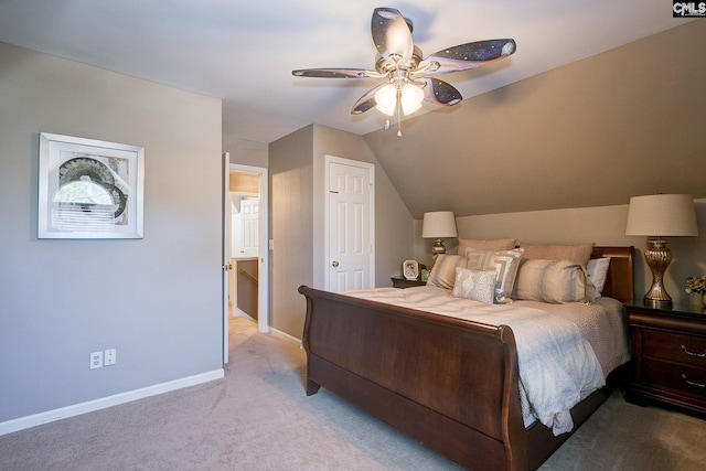 bedroom featuring baseboards, ceiling fan, lofted ceiling, and light colored carpet