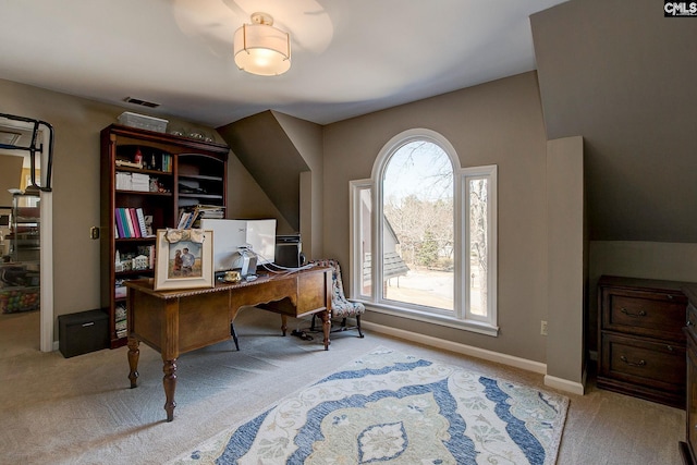 office space featuring carpet floors, a wealth of natural light, and baseboards