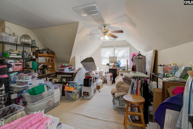 bonus room featuring lofted ceiling, visible vents, ceiling fan, and carpet flooring