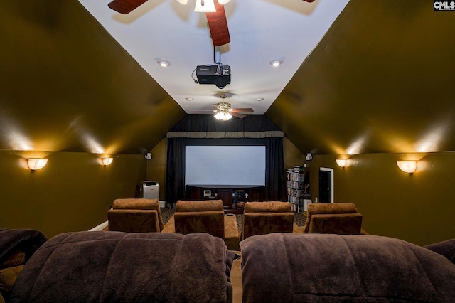 home theater room featuring ceiling fan and vaulted ceiling