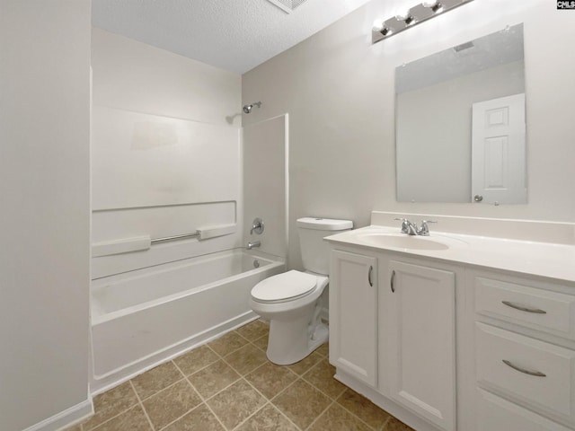 full bathroom featuring toilet, vanity, tile patterned flooring, a textured ceiling, and shower / bathtub combination