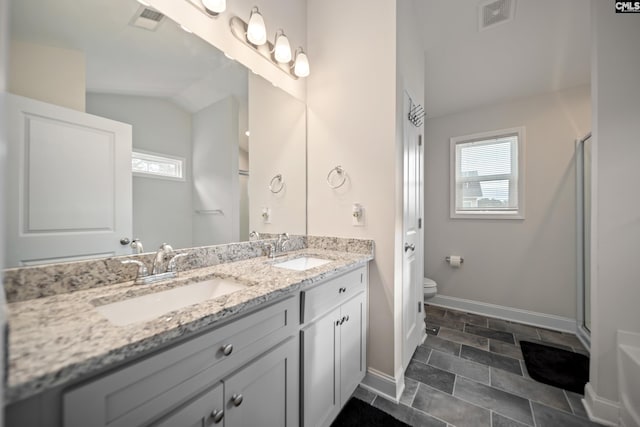 full bath with a wealth of natural light, a sink, and visible vents