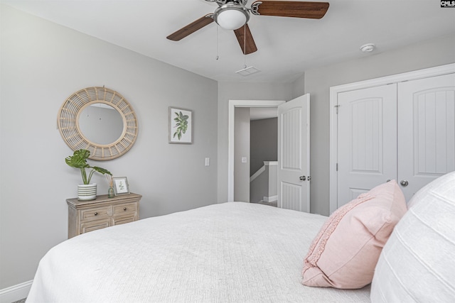 bedroom with a closet and a ceiling fan