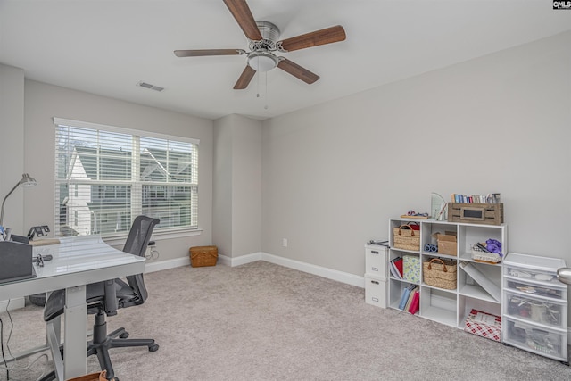 home office with ceiling fan, carpet flooring, visible vents, and baseboards