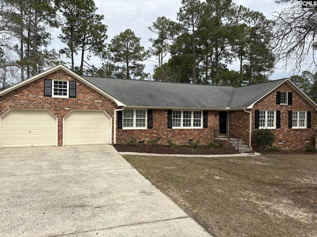 view of front of property with an attached garage, brick siding, a shingled roof, concrete driveway, and crawl space