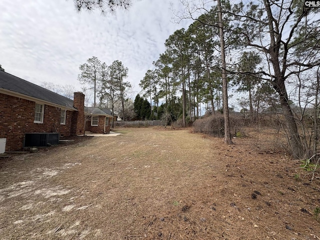 view of yard featuring central AC unit