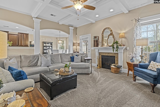 living room featuring carpet floors, coffered ceiling, visible vents, beam ceiling, and ornate columns