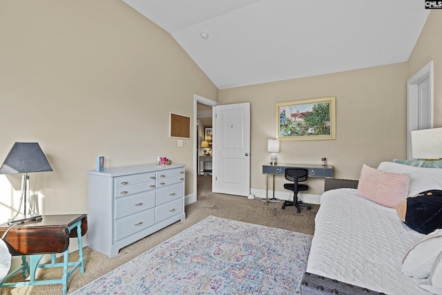 bedroom with lofted ceiling, light colored carpet, and baseboards