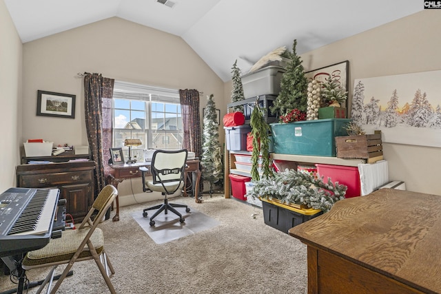 carpeted office space featuring lofted ceiling and visible vents