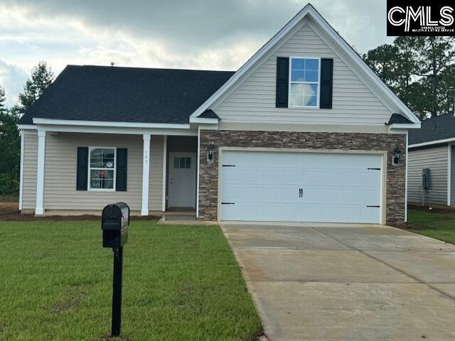 view of front of home featuring stone siding, a front yard, concrete driveway, and an attached garage