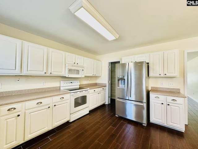 kitchen featuring dark wood-style floors, light countertops, white appliances, and white cabinetry