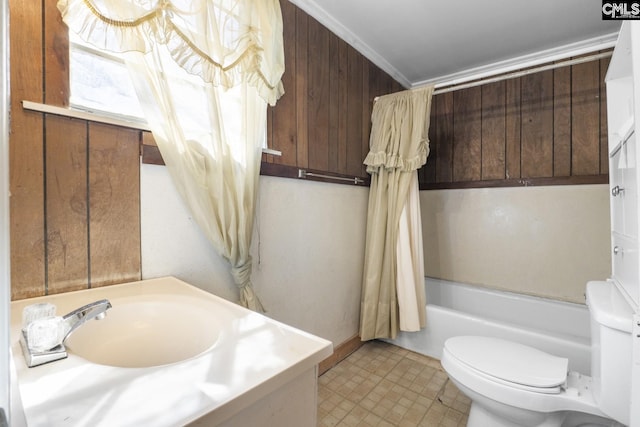 full bathroom with toilet, shower / tub combo, vanity, ornamental molding, and tile patterned floors