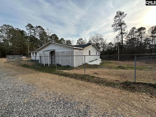 view of side of property featuring fence private yard