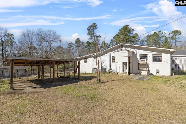 view of outbuilding with a carport