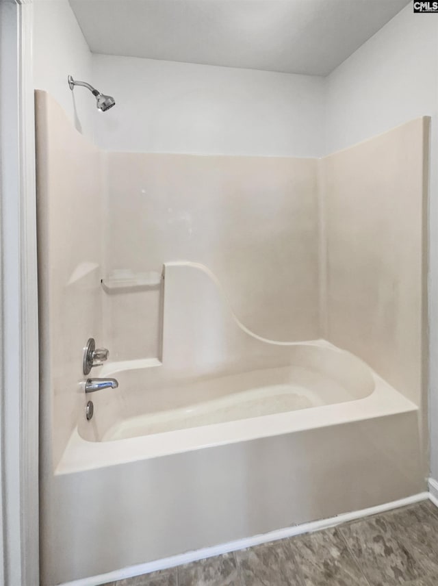 full bath with shower / tub combination