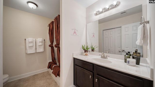 full bath with visible vents, a shower with shower curtain, toilet, vanity, and tile patterned floors