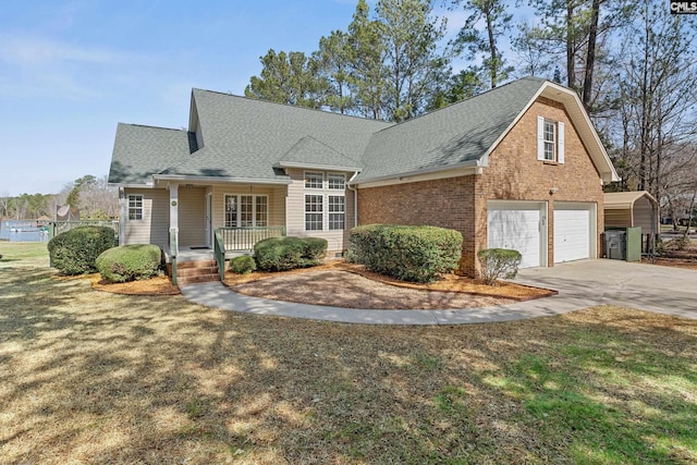 view of front of property featuring an attached garage, covered porch, brick siding, concrete driveway, and roof with shingles