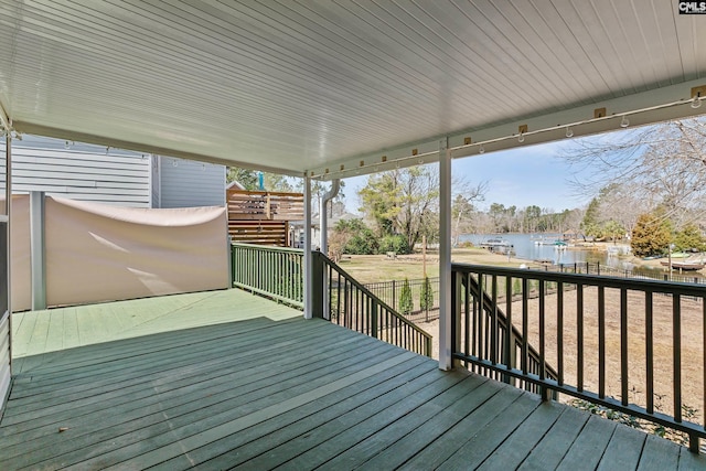 deck featuring a water view