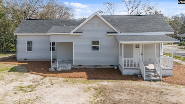 view of front of home with crawl space, a shingled roof, and a porch