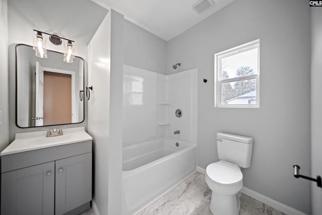 bathroom featuring bathtub / shower combination, toilet, vanity, baseboards, and marble finish floor