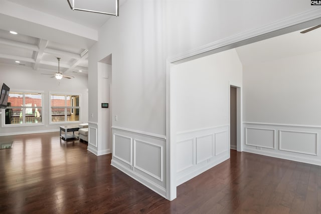 hall featuring dark wood finished floors, coffered ceiling, beamed ceiling, and recessed lighting