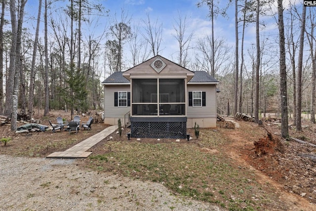 back of property featuring a sunroom