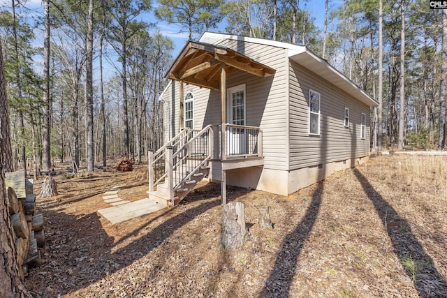 view of property exterior featuring crawl space