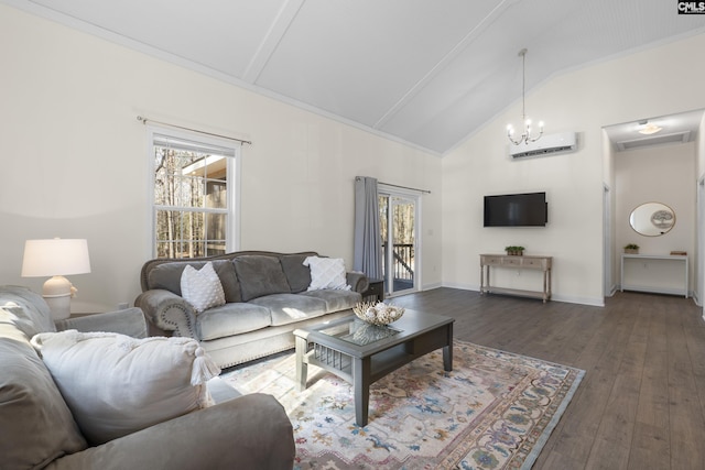 living room with high vaulted ceiling, baseboards, an AC wall unit, wood-type flooring, and an inviting chandelier