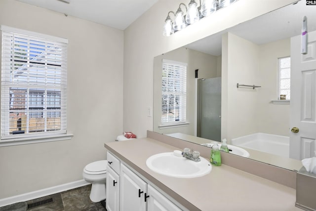 bathroom featuring a stall shower, baseboards, visible vents, toilet, and vanity