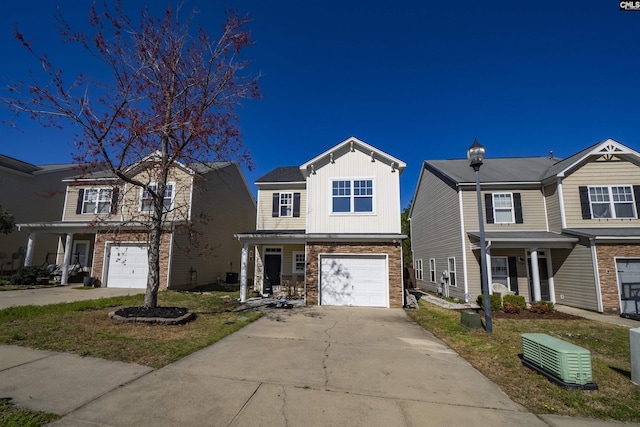 view of front of home featuring a garage, driveway, and board and batten siding