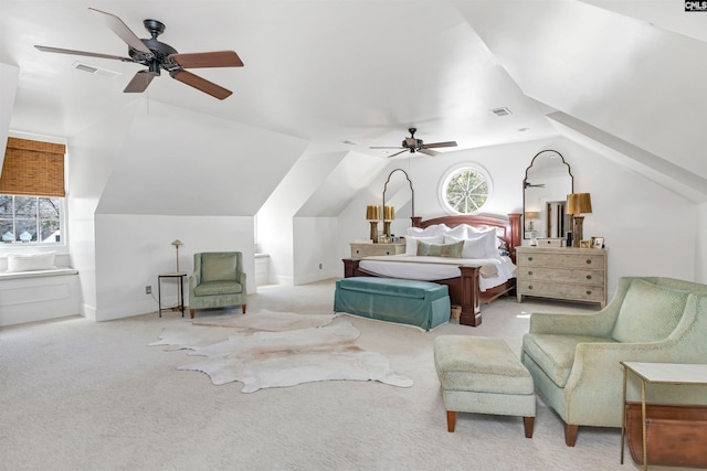 bedroom with light carpet, multiple windows, visible vents, and lofted ceiling