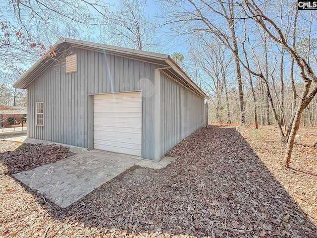 detached garage with driveway