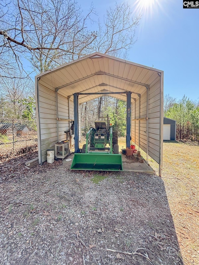 view of vehicle parking featuring a detached carport