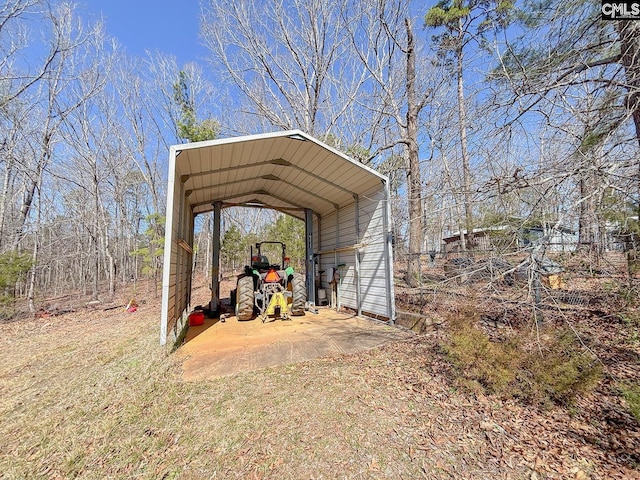 view of outdoor structure with a carport