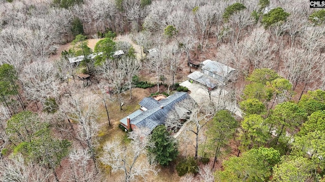 bird's eye view featuring a view of trees