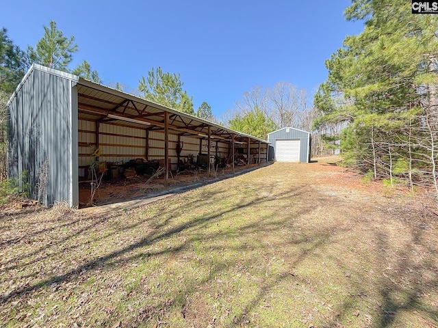 exterior space with dirt driveway