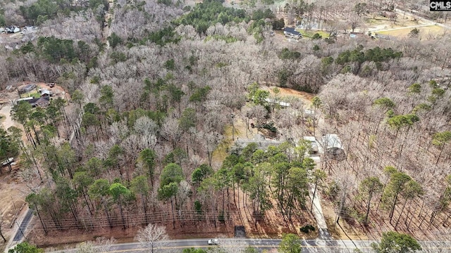 aerial view with a wooded view