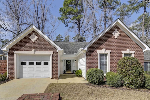 ranch-style house featuring a garage, concrete driveway, brick siding, and a shingled roof