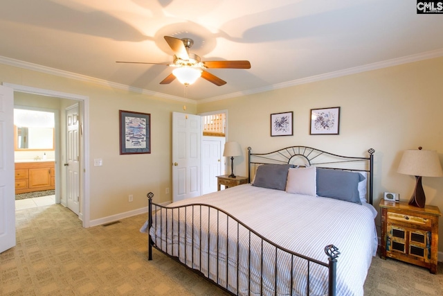 bedroom featuring baseboards, ornamental molding, visible vents, and light colored carpet