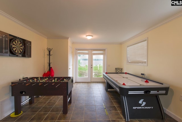 game room with french doors, crown molding, baseboards, and tile patterned floors