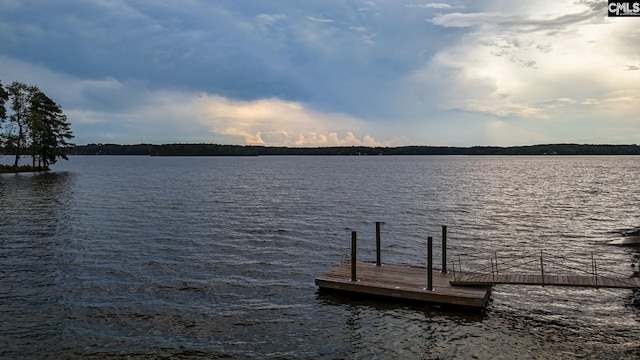 dock area featuring a water view