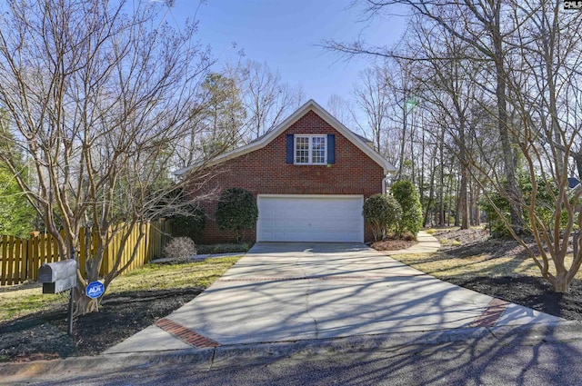 view of property exterior with concrete driveway, brick siding, an attached garage, and fence