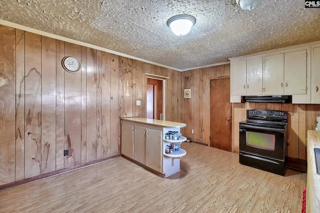 kitchen featuring a peninsula, light wood-style floors, white cabinets, black electric range, and range hood