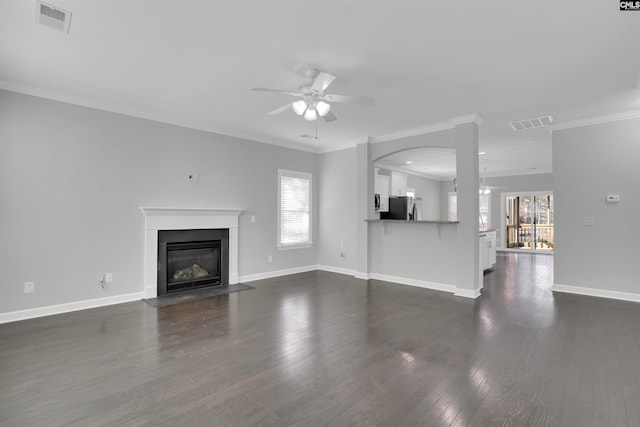 unfurnished living room with ceiling fan, dark wood-style floors, and visible vents