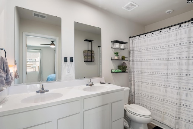 full bathroom with visible vents, a sink, and double vanity