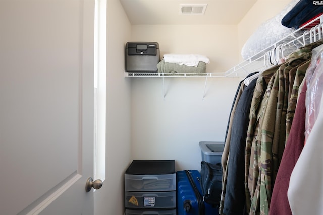 walk in closet with visible vents