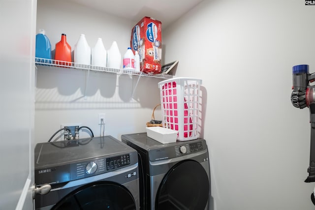 laundry room featuring laundry area and washer and dryer