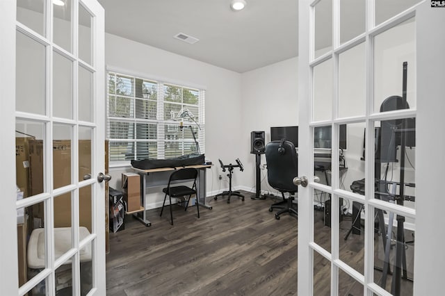 office area with french doors, baseboards, visible vents, and dark wood finished floors